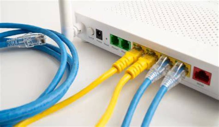 How do I open ports on a router manually?