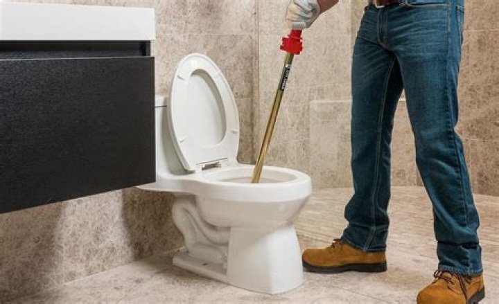 Is it OK to leave a clogged toilet overnight?