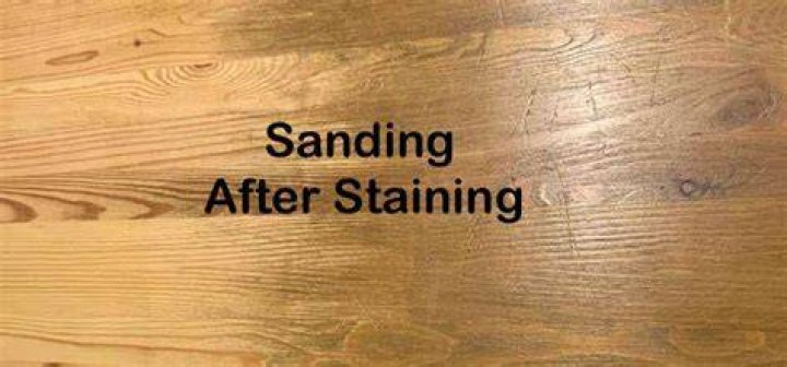 Should you sand after staining?